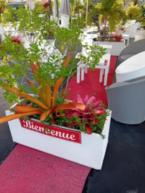 Bungalow charmant à Sainte-Rose avec piscine partagée